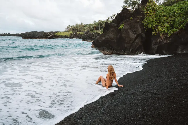 Soaking in the ethereal beauty of this black sand beach
